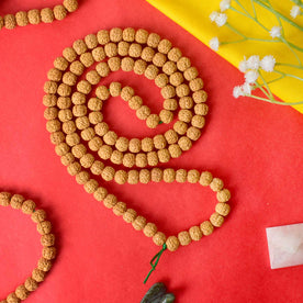 Semi Pathariya Rudraksha Mala with natural brown beads for meditation and spiritual chanting. India’s Premium Rudraksha Jap Mala Store- www.japay.in
