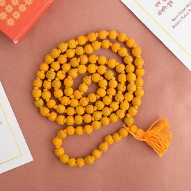 Natural Haldi (Turmeric) Jaap Mala, featuring vibrant turmeric-colored beads strung together, traditionally used for meditation, mantra chanting, and spiritual practices. India’s Premium Jap Mala Store- www.japay.in
