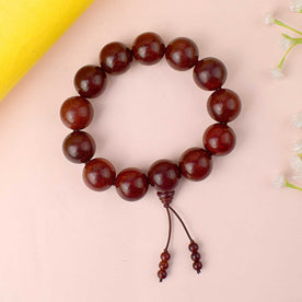 Original 13 Beads Red Chandan Bracelet made from 18mm sandalwood beads of Andhra Pradesh. India’s Largest Pooja Accessories Brand - www.Japay.in