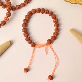 Handcrafted dark brown Rudraksha bracelet made with sacred beads for spiritual balance and meditation. India’s Premium Rudraksha Jap Mala Store- www.sjapay.in


