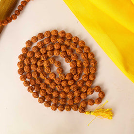 Certified natural brown Rudraksha mala with spiritual beads for mantra chanting and meditation. India’s Premium Rudraksha Jap Mala Store- www.japay.in
