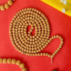 Semi Pathariya Rudraksha Mala with natural brown beads for meditation and spiritual chanting. India’s Premium Rudraksha Jap Mala Store- www.japay.in
